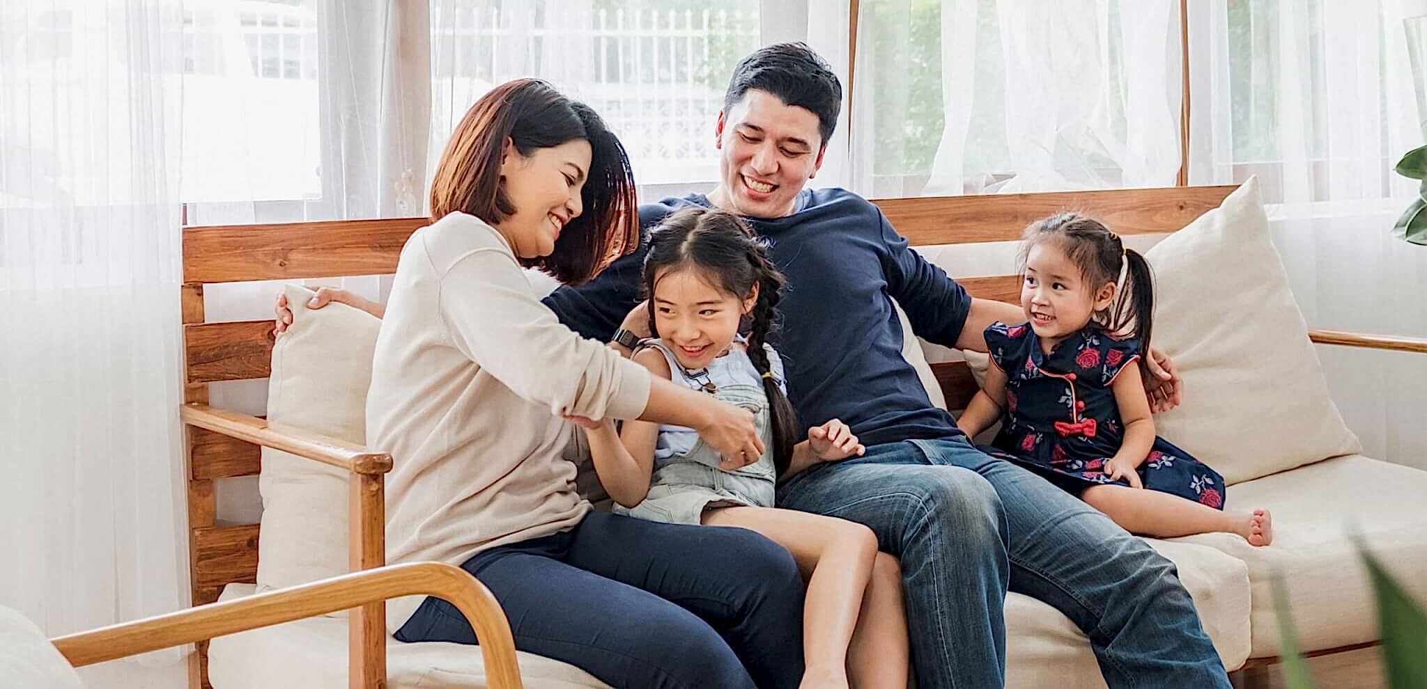 Family enjoying natural light through new windows