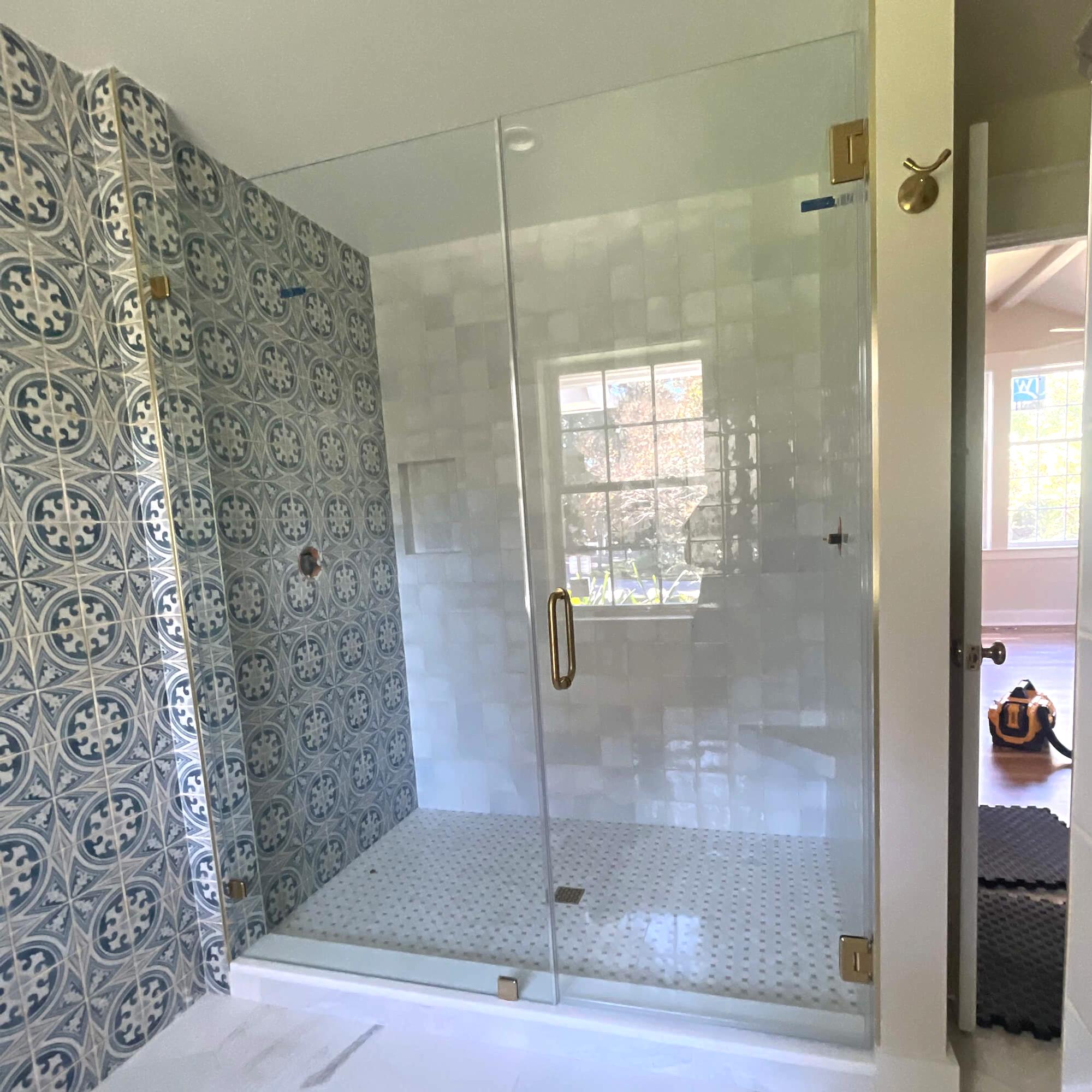 frameless glass shower door with D pull