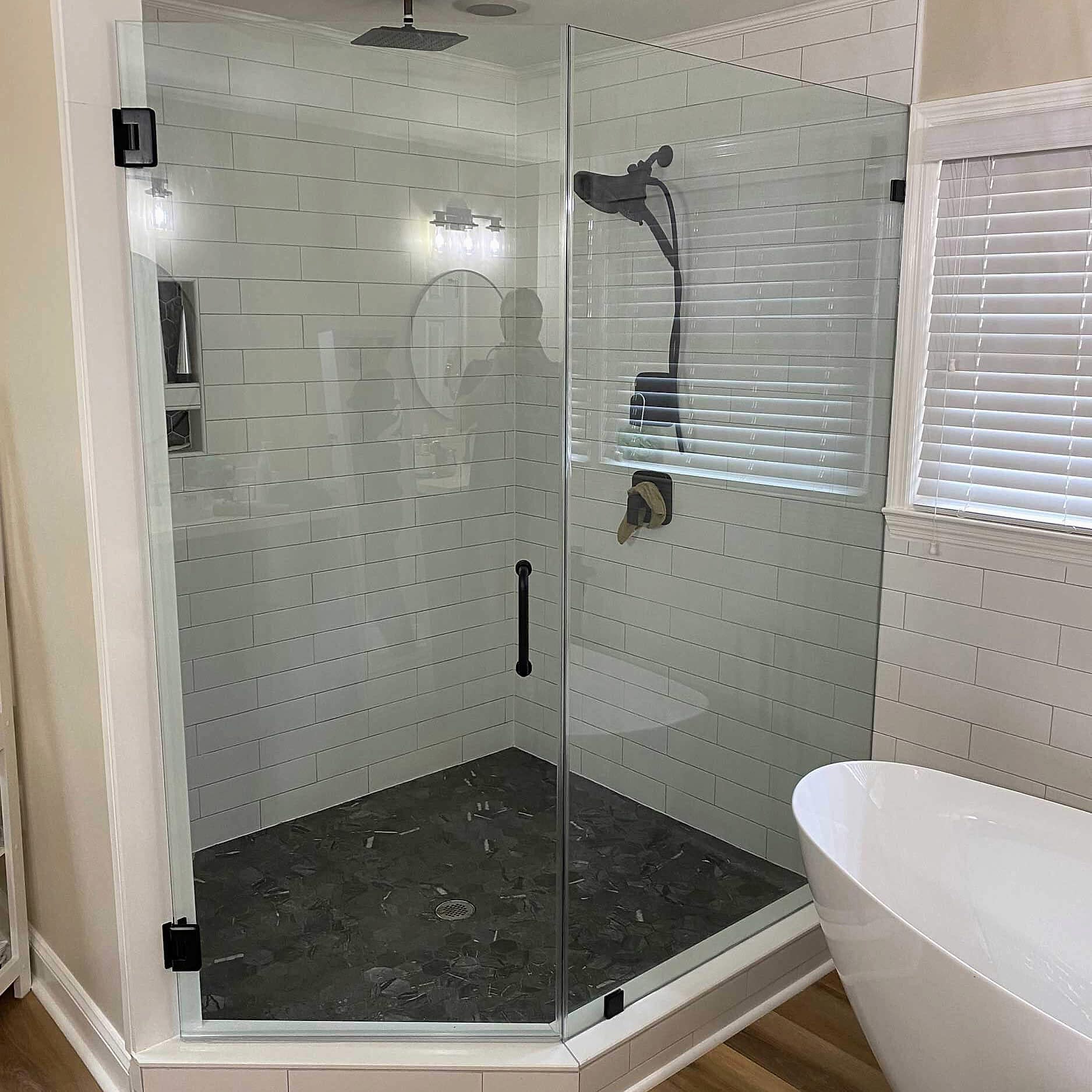 frameless glass shower enclosure with glass coating and  D pull